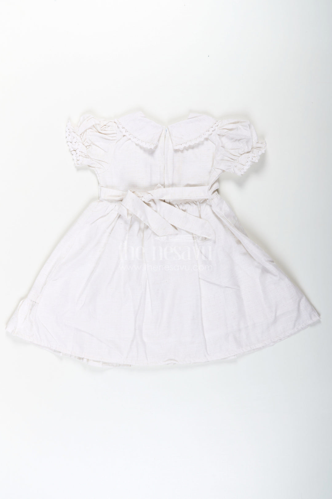 The Nesavu Girls Cotton Frock White Cotton Frocks for Girls with Floral Embroidery Puff Sleeves and Peter Pan Collar Nesavu White Cotton Frocks for Girls with Embroidery Puff Sleeves and Peter Pan Lace Collar | The Nesavu