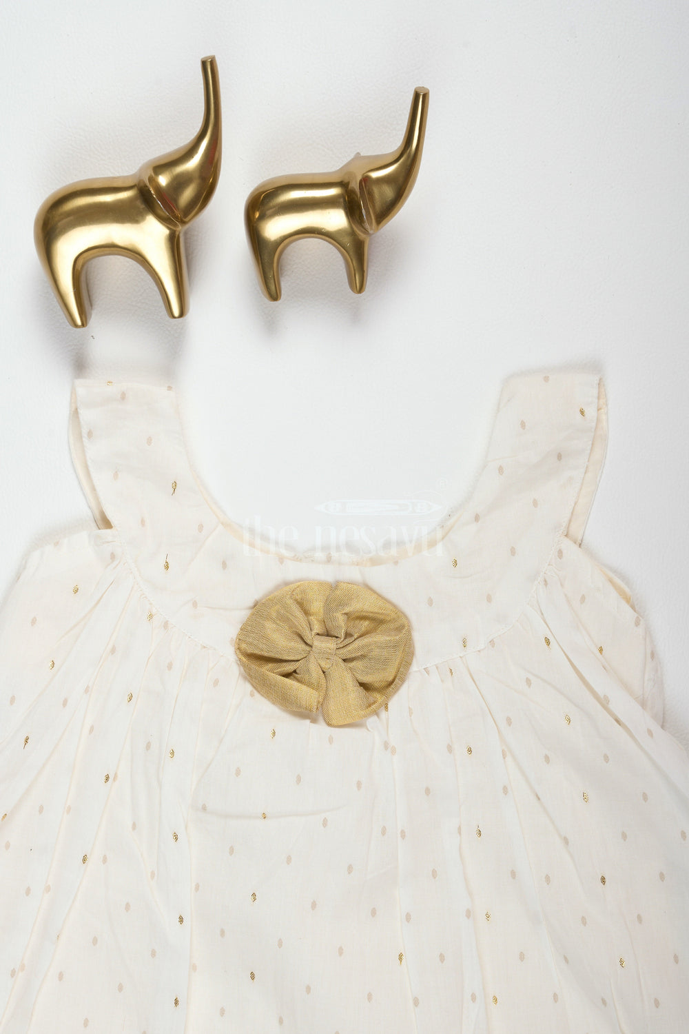 The Nesavu Baby Cotton Frocks White Frock ALine Cotton Dress with Golden Motifs and Tissue Hemline Nesavu White A-Line Cotton Frock with Golden Motifs and Tissue Hemline for Girls Nesavu