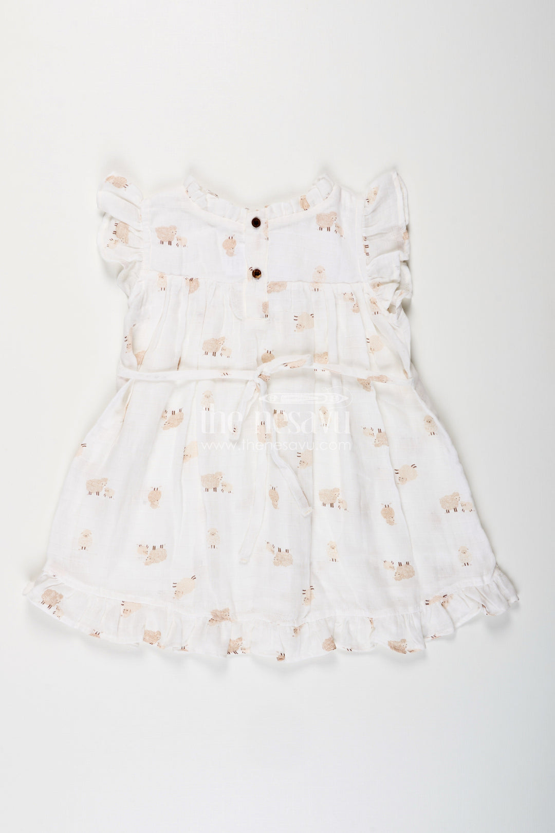 The Nesavu Girls Cotton Frock White Muslin Cotton Frock for Baby Girls with Soft Sheep Print Nesavu Nesavu baby girls white muslin cotton frock with sheep print and ruffle detailing for everyday wear