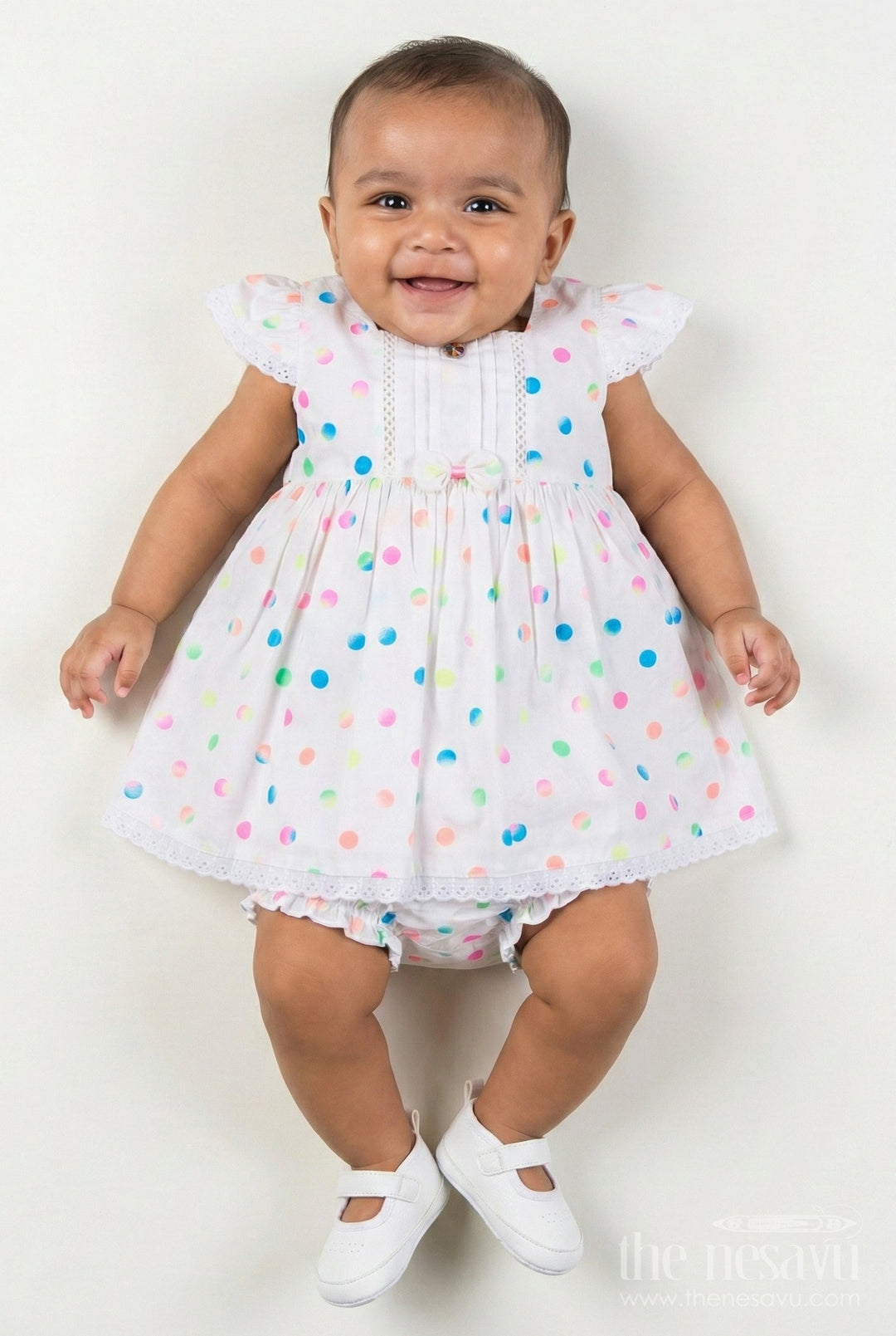 The Nesavu Baby Cotton Frocks White Newborn Clothes in Cotton with Neon Polka Dot Print and Frilly Sleeves for Baby Girls Nesavu 14 (6M) / White BFJ806A-14 Nesavu White Cotton Newborn Clothes Neon Polka Dots Lace Trimmed Sleeves Baby Girls
