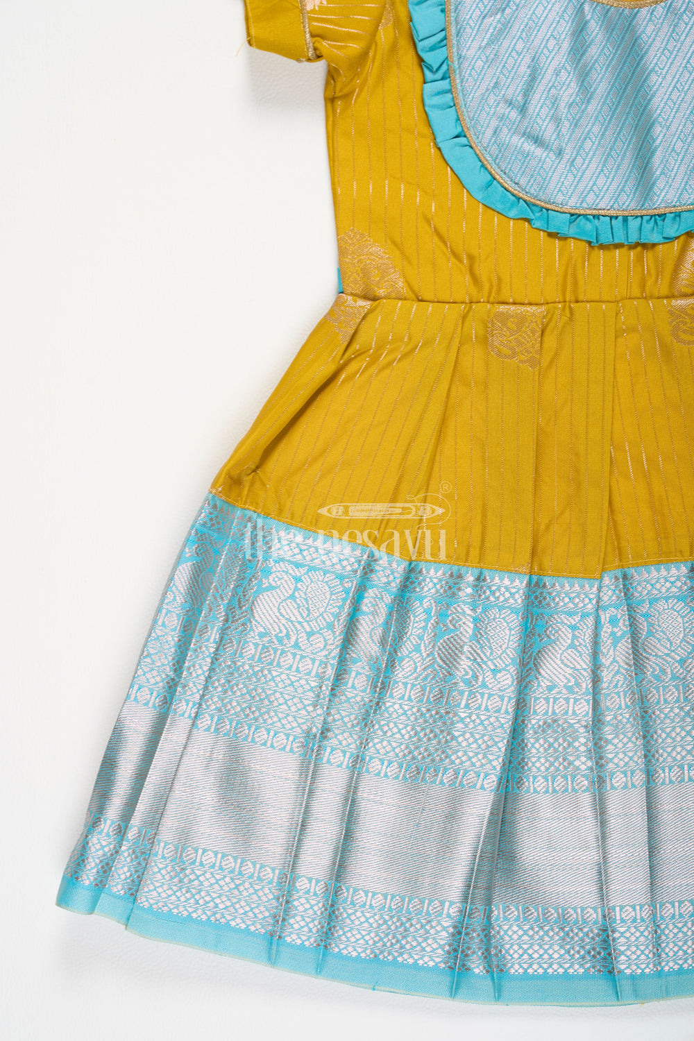 The Nesavu Girls Kanchi Silk Frock Yellow and Blue Semi Kanchivaram Silk Frock with Silver Zari and Puff Sleeves for Festive Occasions Nesavu Nesavu Yellow Blue Semi Kanchivaram Silk Frock Silver Zari Puff Sleeves Weddings Festivals