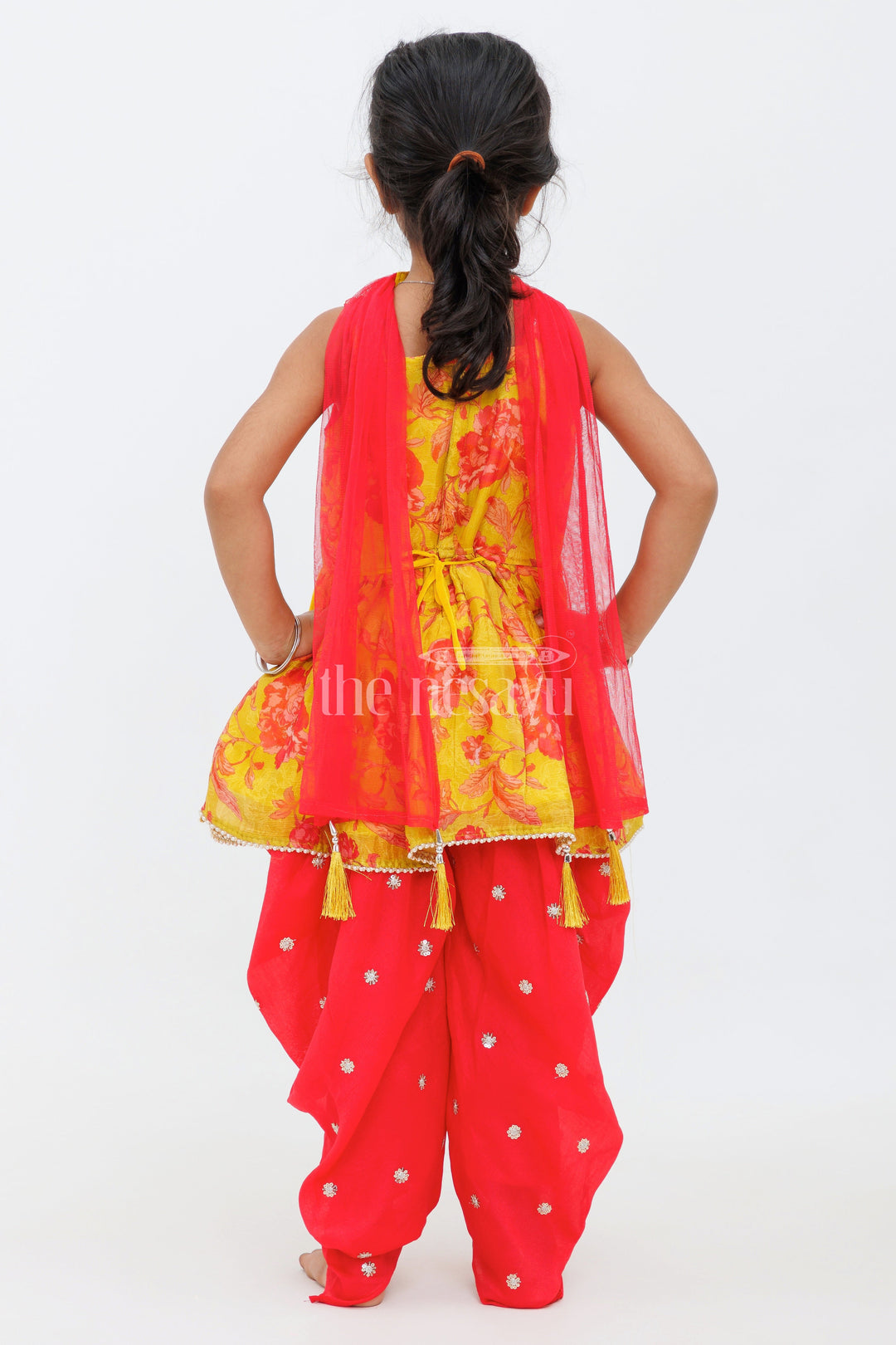 The Nesavu Girls Dothi Sets Yellow Chinon Silk Printed Peplum Top and Dhoti Set for Girls with Sequin and Mirror Detailing Nesavu Yellow Chinon Silk Printed Peplum Top and Dhoti Set for Girls with Sequin and Mirror Detailing Nesavu