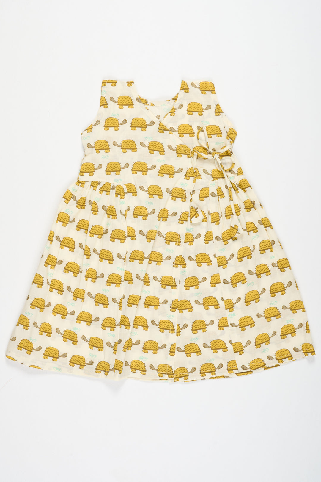 The Nesavu Baby Cotton Frocks Yellow Cotton Frock with Tortoise Print for Babies Lightweight and Breathable Summer Outfit Nesavu Nesavu Yellow Cotton Baby Frock Tortoise Print Fun Comfortable Summer Outfit