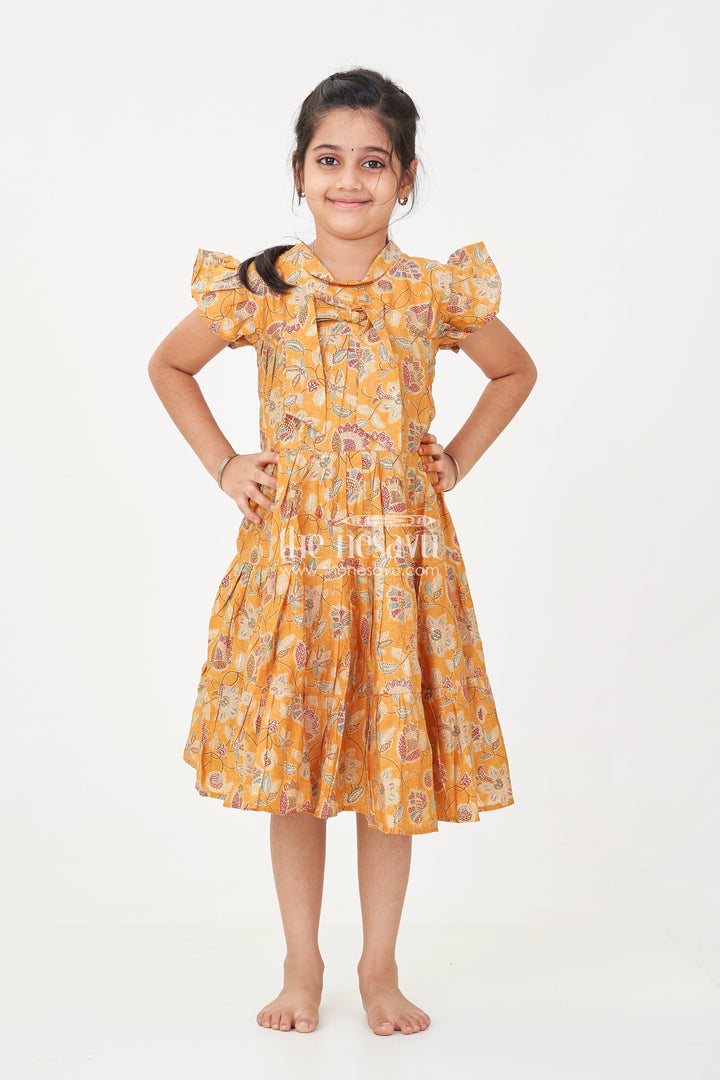 The Nesavu Girls Cotton Frock Yellow Frock for Baby Girls in Modal Silk with Digital Floral Print and Ruffled Sleeves Nesavu Yellow Frock Baby Girls Soft Modal Silk Floral Digital Print Ruffle Detailing | The Nesavu