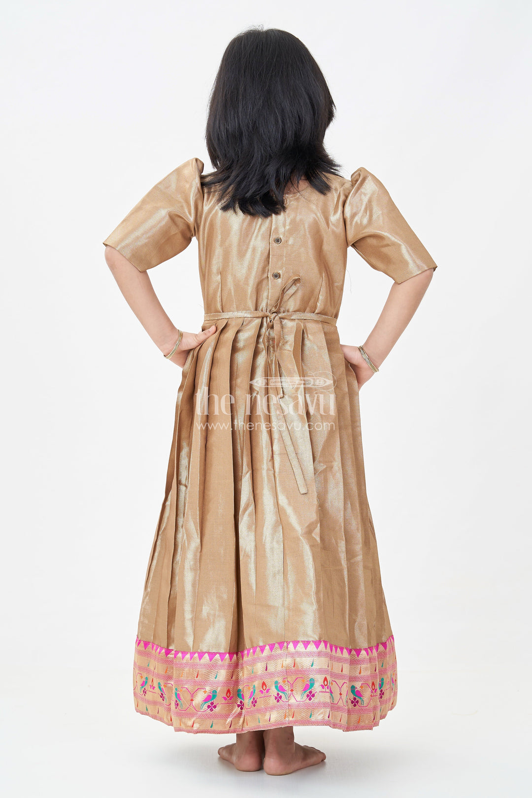 The Nesavu Girls Silk Gown Yellow Gold Gown for Girls in Tissue Silk with Rich Pleats and Paithani Embellished Hemline Nesavu Yellow Gold Gown Girls Tissue Silk Pleated Design Paithani Hemline | The Nesavu