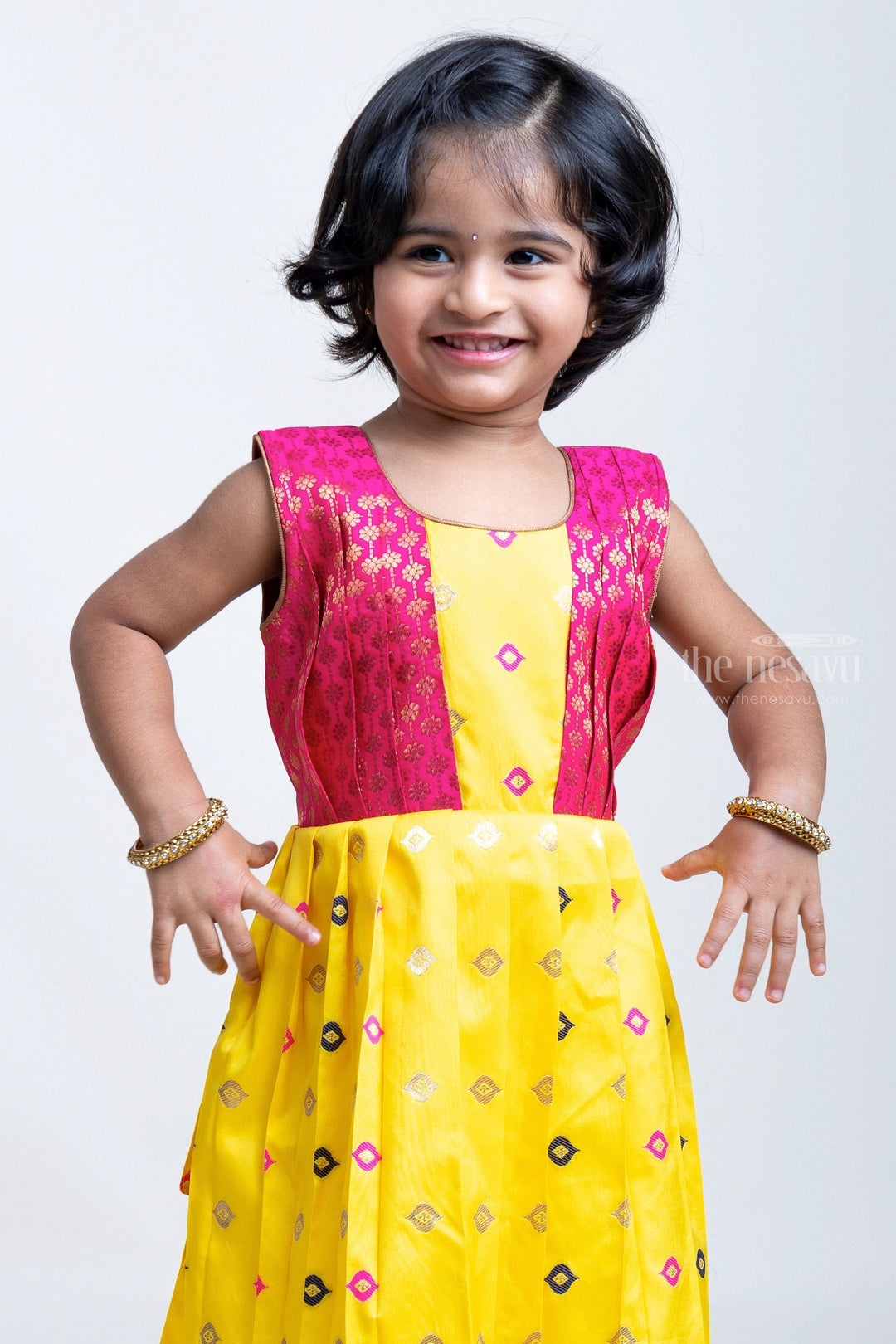 The Nesavu Silk Frock Yellow Pleated Semi-Silk with Red Designer Yoke Frock For Girls Nesavu Latest Model Frocks Designs | The Nesavu | Silk Frock Collection