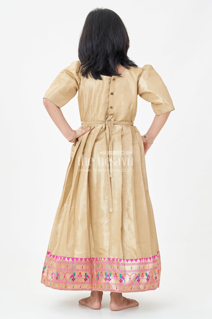 The Nesavu Girls Silk Gown Yellow Silk Gown for Girls in Tissue Silk with Traditional Paithani Border and Short Sleeves Nesavu Yellow Silk Gown Girls Tissue Fabric Paithani Border Traditional Pleats | The Nesavu