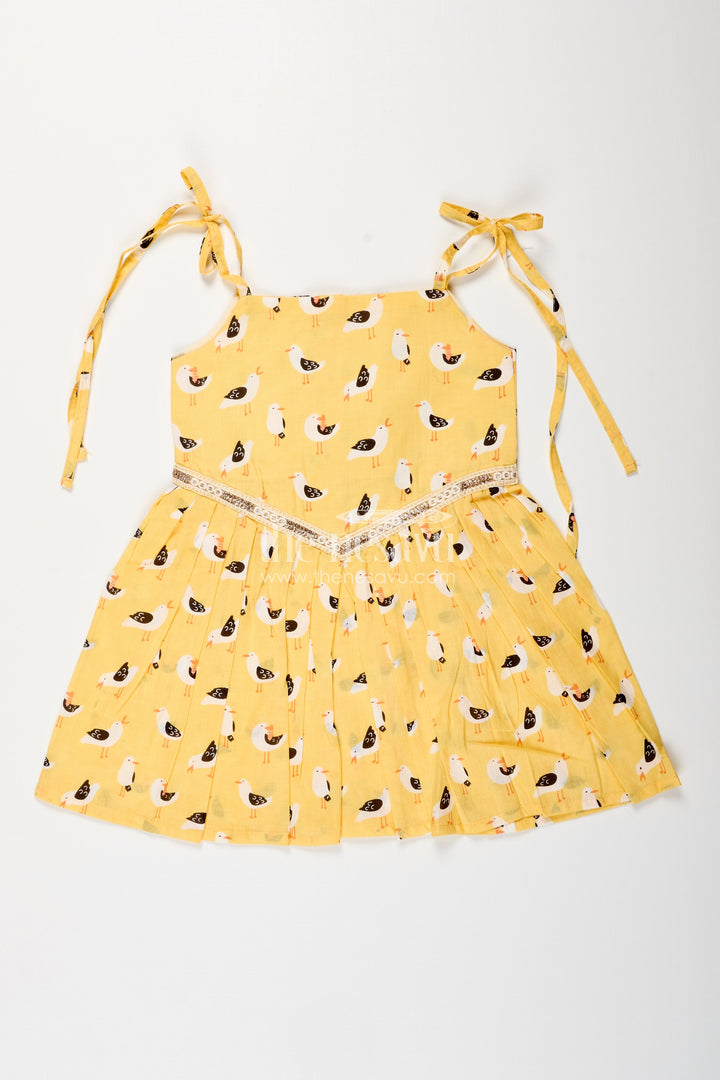 The Nesavu Tie-up Frock Yellow Tie-Up Cotton Frock for Toddler Girls with Playful Bird Print Nesavu 18 (2Y) / Yellow T414B-18 Nesavu yellow cotton tie-up frock for toddler girls with playful bird print and pleated flare