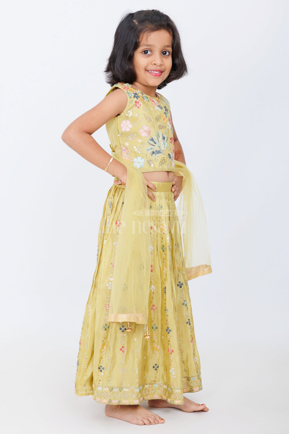 The Nesavu Girls Lehenga Choli Yellow Viscose Embroidery Girls Lehenga Choli with Floral Sequin Detailing and Sleeveless Blouse Nesavu Nesavu Yellow Girls Lehenga Choli Floral Embroidery Sequin Details Festive Wear