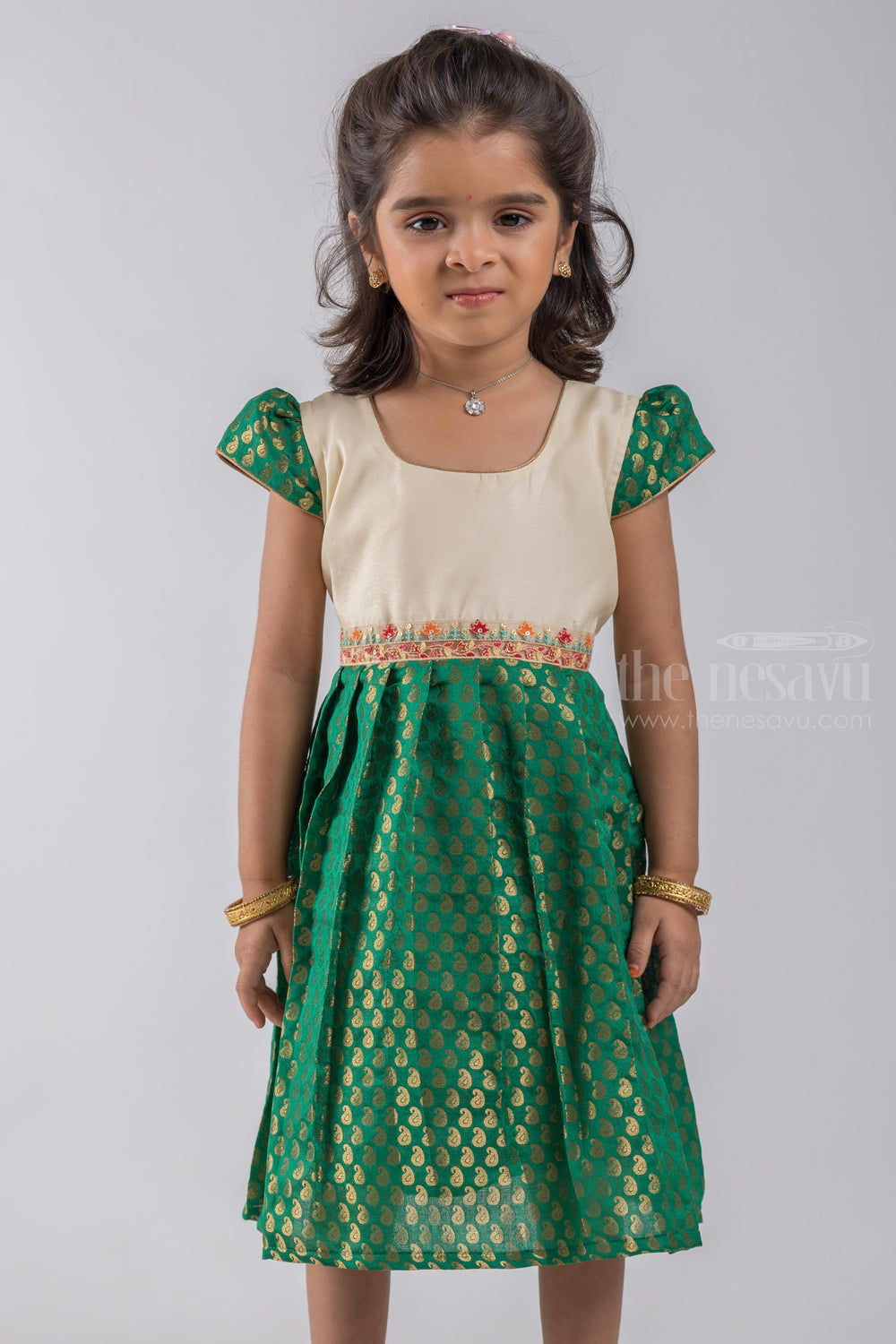 The Nesavu Silk Embroidered Frock Zari with Paisley Designer Knife Pleated Green Silk Frock with White Yoke for Girls psr silks Nesavu