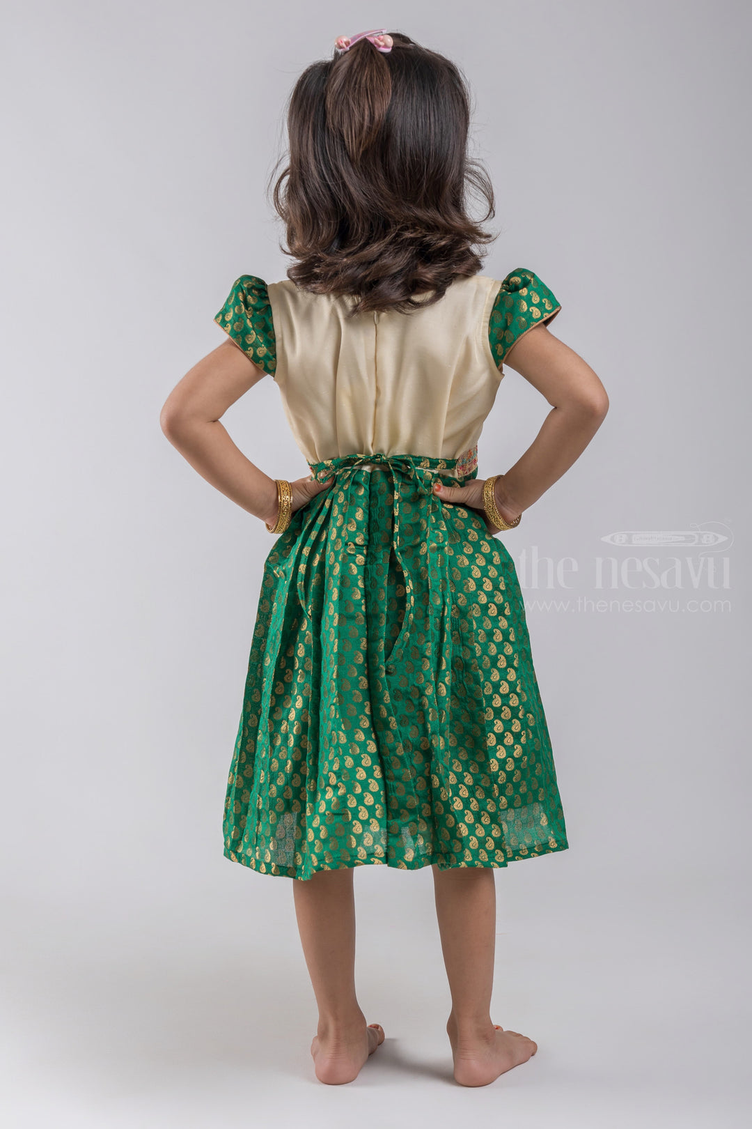 The Nesavu Silk Embroidered Frock Zari with Paisley Designer Knife Pleated Green Silk Frock with White Yoke for Girls psr silks Nesavu