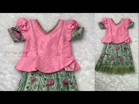 Premium Green Silk Pattu Pavadai with Salmon Pink Floral Cuffs and Banarasi Border for Girls