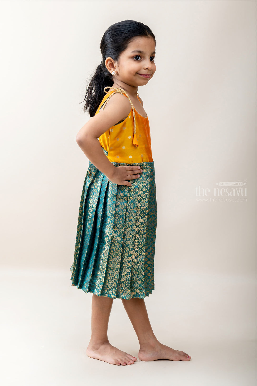 The Nesavu Tie-up Frock Dark Seagreen Banarasi Brocade Silk With Yellow Yoke Tie UP Frock. psr silks Nesavu