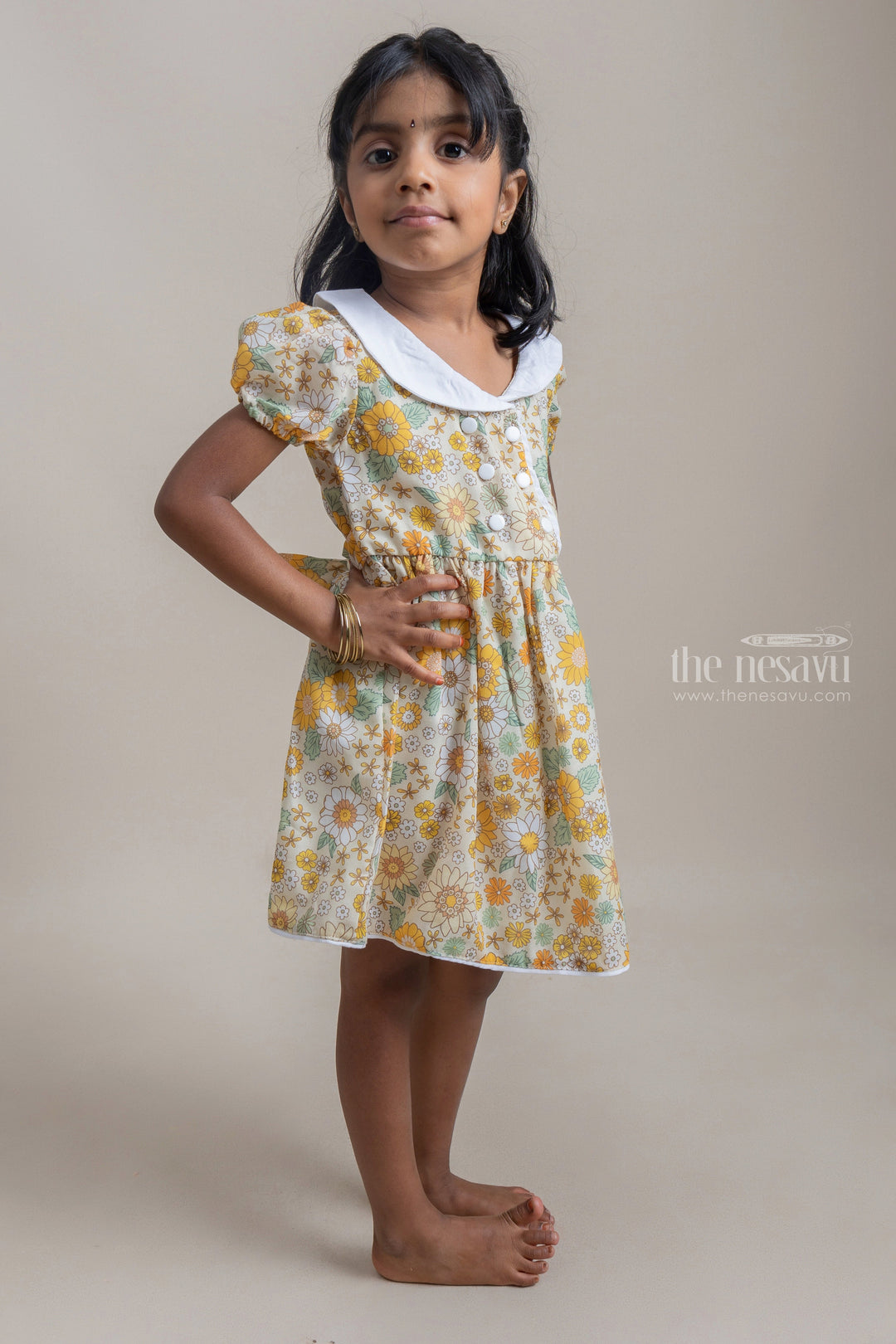 The Nesavu Frocks & Dresses Fancy Yellow Floral Printed Button Closure Daily Wear Cotton Frock For Girls psr silks Nesavu