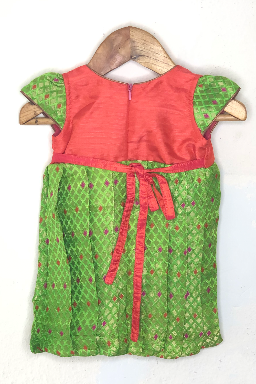 The Nesavu Silk frocks Green Jacquard Silk Frock With Simple Orange Yoke For Baby Girls psr silks Nesavu