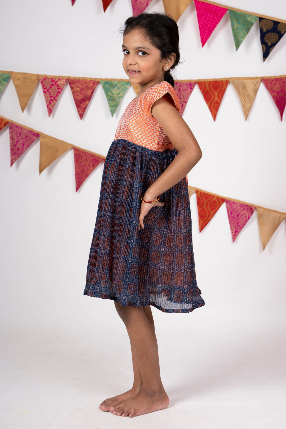 The Nesavu Frocks & Dresses Latest Crushed Semi-Cotton Gown With Contrasting Flutter Sleeve Yoke For Girls psr silks Nesavu